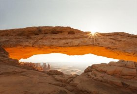 The underside of Mesa Arch basks in a morning glow. Image by Philip Lee Harvey / Lonely Planet Traveller.